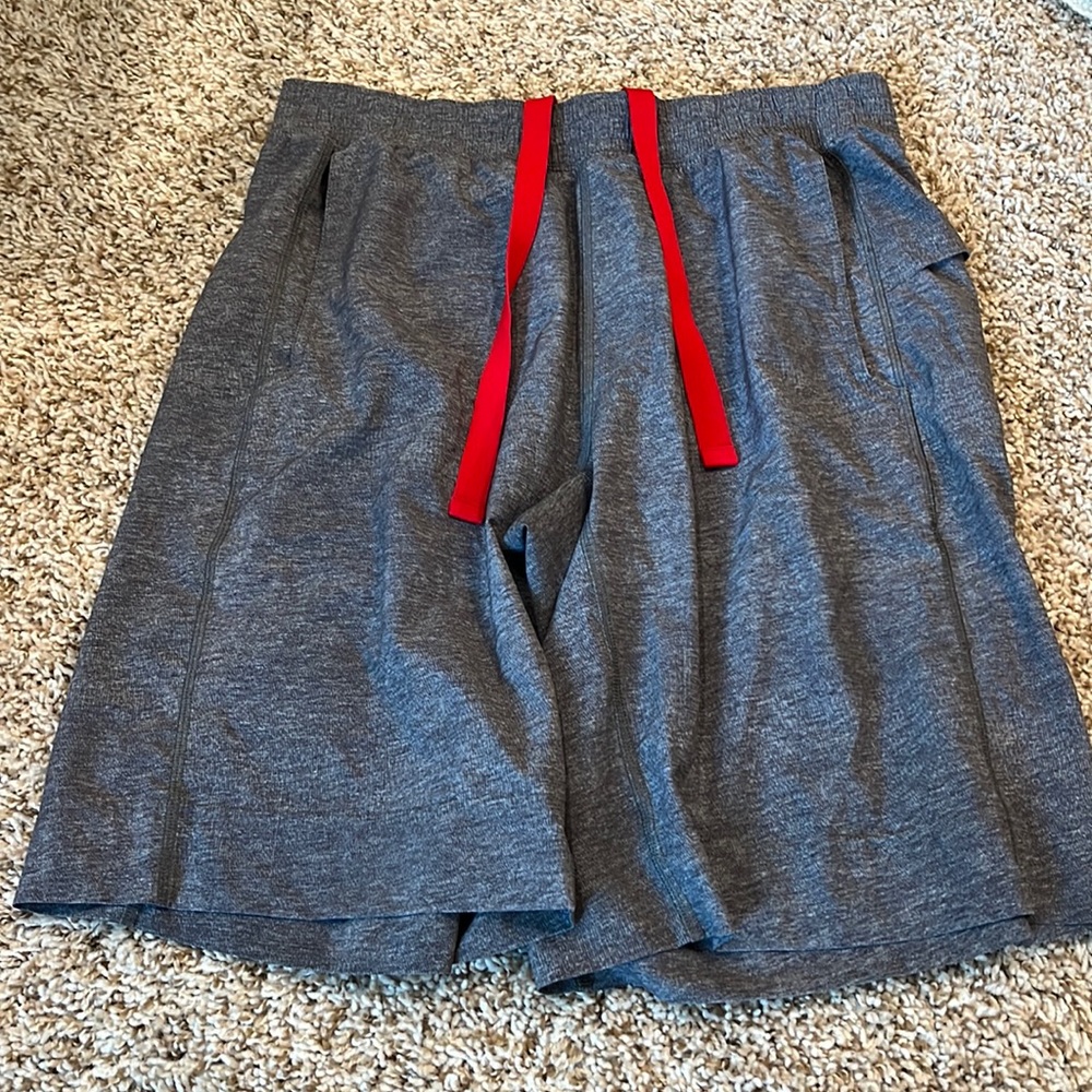 Mens Lululemon shorts. Unlined size large. Lots of pockets great condition